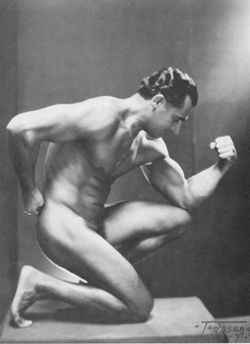 Charles Atlas poses