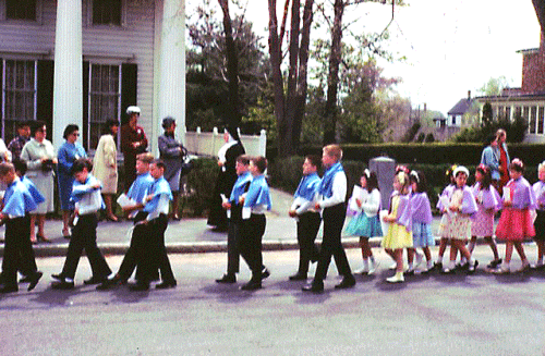 May, 1967 A.D.—Parish May Procession with the First Holy Communion children, Mary Immaculate of Lourdes, passing in front of the St. Elizabeth Center.