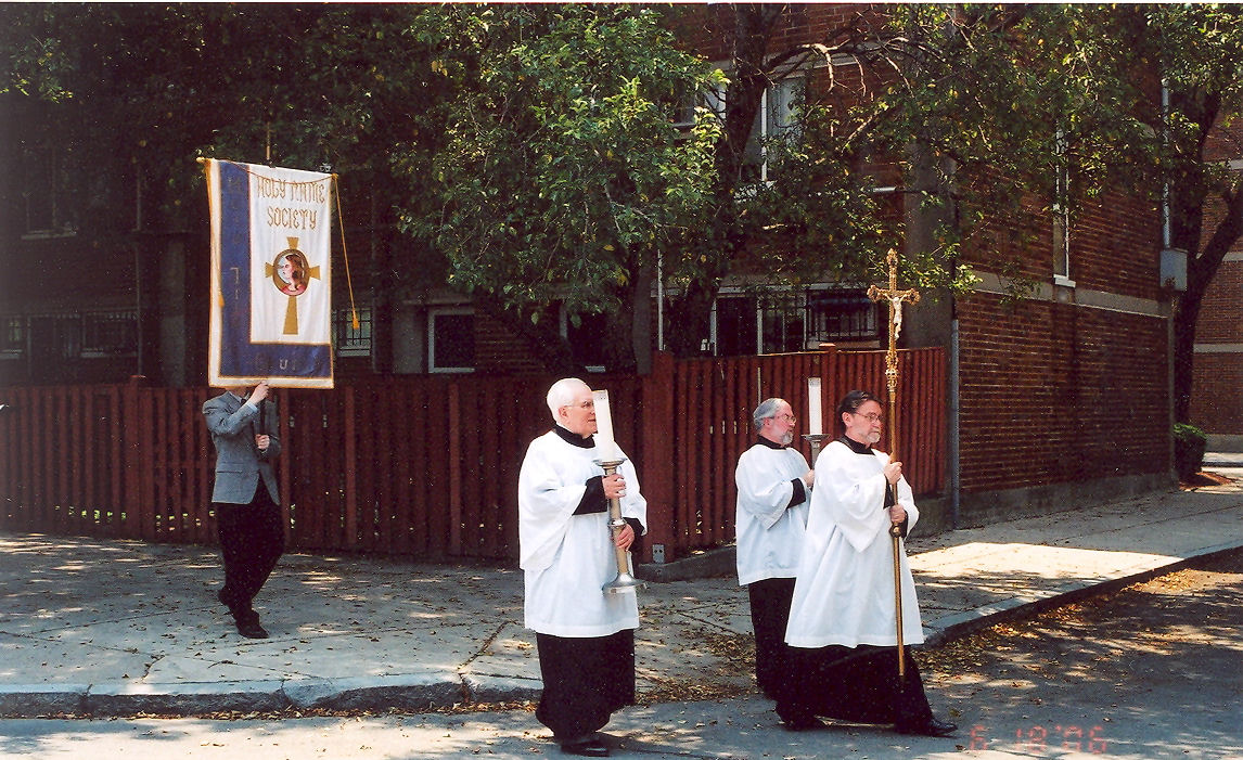 Cross Bearer, Acoyltes, and Holy Name Society Banner