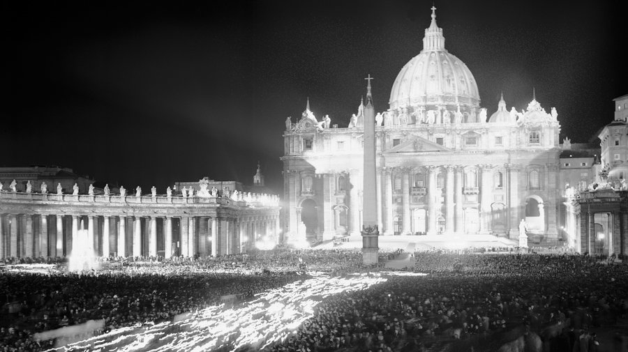Youths from Catholic Action, carrying lighted torches, form a giant cross of light around the central obelisk in St. Peter's Square in Vatican City on Oct. 11, 1962, the opening day of the historic Second Vatican Council.